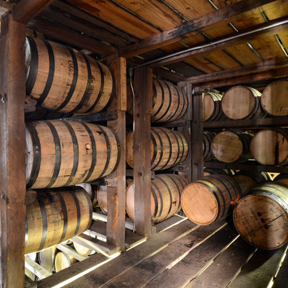 Bourbon barrels in a rickhouse