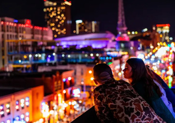 Visitors view downtown Nashville from The Lookout rooftop bar at the Ole Red entertainment complex. Photo from the Ole Red website.