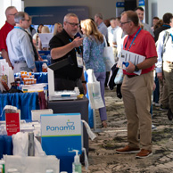 Attendee at a vendor booth at the APCI Annual Convention